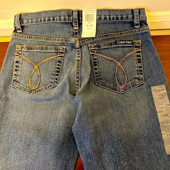Calvin Klein Mid Rise Flared Fit Jeans in blue size 4 - Picture 5 of 9
